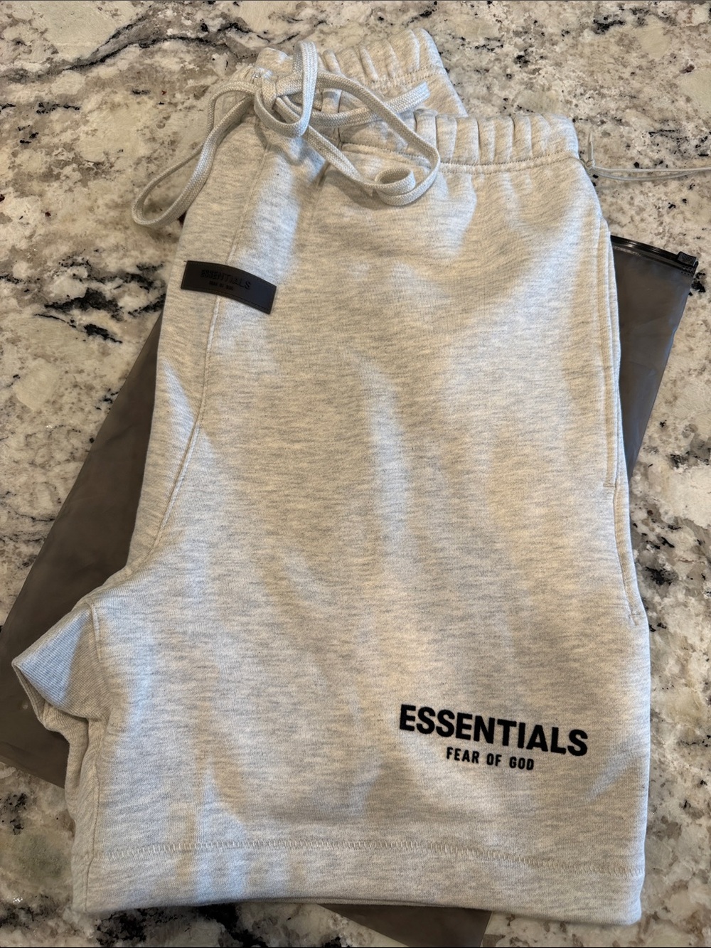 Fear of God ESSENTIALS Heather Light Gray Sweat Shorts